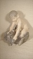 figurin
Faun on Bear
Kgl no 648
Royal 
Copenhagen