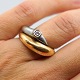 Ole Lynggaard; "Fidelity" ring of 14k gold and white gold, set with a brilliant-cut diamond, ...