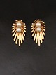 14 carat gold 
ear clip 2.2 x 
1.2 cm. with 
genuine pearls 
stamped 585 BH 
for court 
jewelers B ...