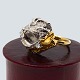 Julia Plana; Ring i 18 kt. guld og hvidguld, prydet med seks diamanter, i alt ca. 0,70 ct. Ring ...