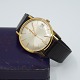Omega; A gentleman's wristwatch in steel with gold. Ref. 132-019. Cal: 611. Steel with ...
