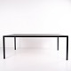 HAY T12 dining 
table with a 
black linoleum 
tabletop and 
black 
powder-coated 
aluminium 
frame. A ...