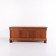 Chest/sideboard 
from the 1920s, 
crafted in oak 
with decorative 
carved details 
and round legs. 
...
