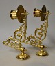 Pair of brass piano candlesticks, 19th century.