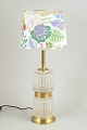 Swedish designer table lamp with shade by Josef Frank.Elegant table lamp in brass with two ...