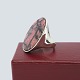 Hugo Grün; A ring set with a large oval tugtupit.Ring size 53. Stamped "H.Gr. 585".made by ...