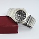 Omega; A gentleman's wristwatch model Constellation Double Eagle. Steel with steel strap. ...