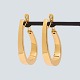 Pair of large earrings in 18k gold