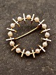 14 carat gold brooch with genuine  pearls