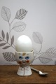 Old egg cup from the 1930s in porcelain with a painted ...
