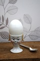 Old egg cup from the 1930s in porcelain with a painted ...