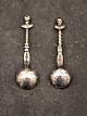 A pair of silver salt spoons