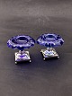 A pair of salt cellersin blue glass