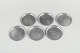 Just Andersen, set of six coasters in pewter with Copenhagen motifs.Set of six coasters in ...