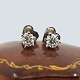 Pair of diamond earrings in 18k white gold