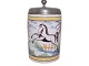 Kellinghusen / Bahlmann, Lubbert Diedrich.Large faience mug decorated with a horse. There is ...