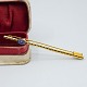 Brooch of 14k gold with sapphire. From around year 1900. L. 6.3 cm. Stamped "585".Please ...