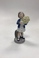 Royal Copenhagen Monthly Figurine May - Girl with Flowers No. 4527. Designed by Hans Henrik ...