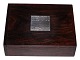Rose wood box with inlaid Hans Hansen sterling silver.From around 1969.On the silver ...