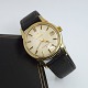 Omega; Constellation wristwatch in steel and gold, 1961