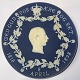 Commemorative plaque marking King Christian IX’s 80th birthday. Features a portrait, a leaf ...