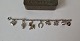 Vintage silver child's bracelet with 8 charms