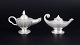 Just Andersen, pair of pewter oil lamps.A pair of sculpturally formed pewter oil lamps with ...
