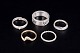 Niels Erik From and others.Set of five Scandinavian sterling silver and gilt silver finger ...