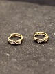 14 carat gold ear clip D. 1.3 cm. with clear stones item no. 648048