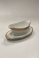 Royal Copenhagen Pattern 594 Gravy Boat No 9344Wear on gold paint may occurMeasures 22 cm / ...
