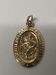 14k. Gold pendant featuring the patron saint of ...