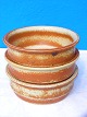 Danish 
stoneware. 3 
bowls with 
ochreous glaze. 
Height 5,5 cms. 
Diameter 15 
cms. Fine 
condition.