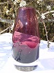 Glass vase in 
em pretty 
purple color, 
height 16 cm. 
Signed Riihiäën 
lasi Finland 
1365, From the 
...