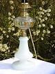 Antique 
paraffin lamp 
of opal glass, 
conversionto  
with electrify. 
Height 58 cms. 
From c. 1880