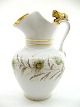 A porcelain 
chocolate jug 
from late 19th 
c marked CT