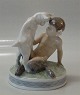 Royal 
Copenhagen 0498 
RC Faun with 
goat 13.5 x 11 
cm. Chr. 
Thomsen 1906 
(498-1012)  In 
mint and ...