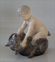Royal 
Copenhagen 0648 
RC Faun with 
bear Chr 
Thomsen 16 cm 
In mint and 
nice condition 
Pan 
Some ...