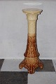 Majoliaka from 
Gustaf Berg 
flower pedestal 
richly modeled 
with cactus 
flower. Height 
88 cm. ...