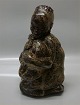 Royal 
Copenhagen 
Stoneware 20244 
RC African boy 
with wild cat 
27 cm Knud Kyhn 
October 1930. 
1st. ...