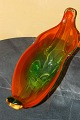 Glassware from 
Italy. Huge 
fruit bowl of 
orange and 
green glass. 
Length 38cm. 
Intact, no 
chipping.