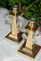 Pair of brass 
candlesticks, 
decorated with 
prisms, height 
21cm. Nice 
well-maintained 
condition.