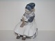 Royal 
Copenhagen 
Figurine, girl 
in national 
dress from 
Amager.
The factory 
mark tells, 
that ...