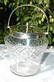 Biscuits bucket 
of clear glass 
with a 
grinding, with 
silver-plated 
mounting. 
Height without 
...