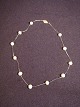 Necklace Silver 
wire with 15 
pieces. 8 mm 
pearls.
Length: 43 cm
Price Dkr. 425