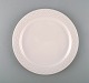 Jens H. Quistgaard for Bing & Grondahl. White "Cordial Palet" dinner plate in glazed stoneware. 1960