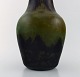 Daum Nancy, France. Colossal art deco vase in mouth-blown art glass in green and brown shades. 1930 / 40s.