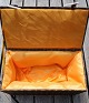 Box of papier mache lined with yellow silk