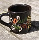 Swedish ceramics, set of 4 small mugs 6cm with black glaze and with decoration.