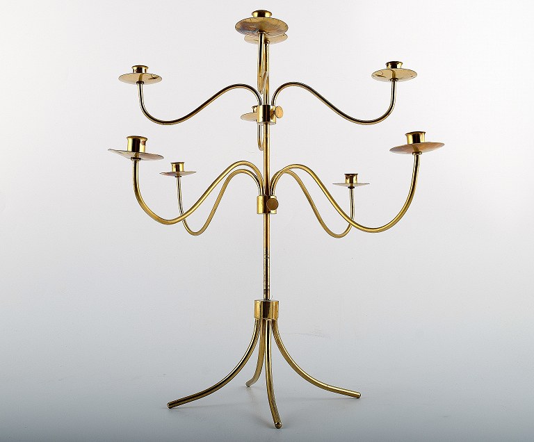 Josef Frank. A mid century nine arm brass candelabra.