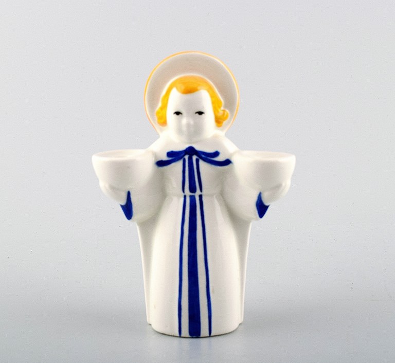 Royal Copenhagen angel candlestick in earthenware. 
